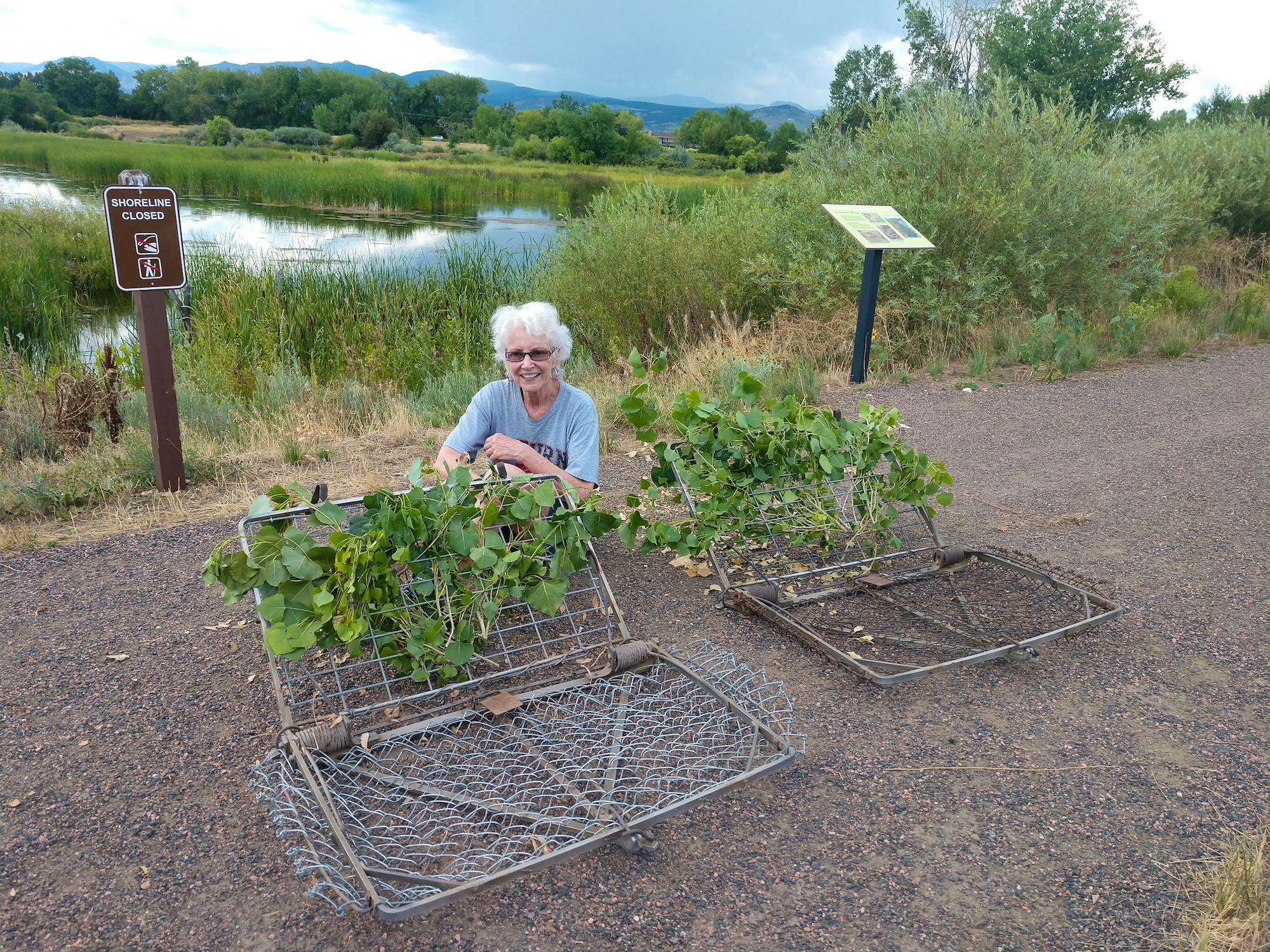 Woman sitting next to beaver trap