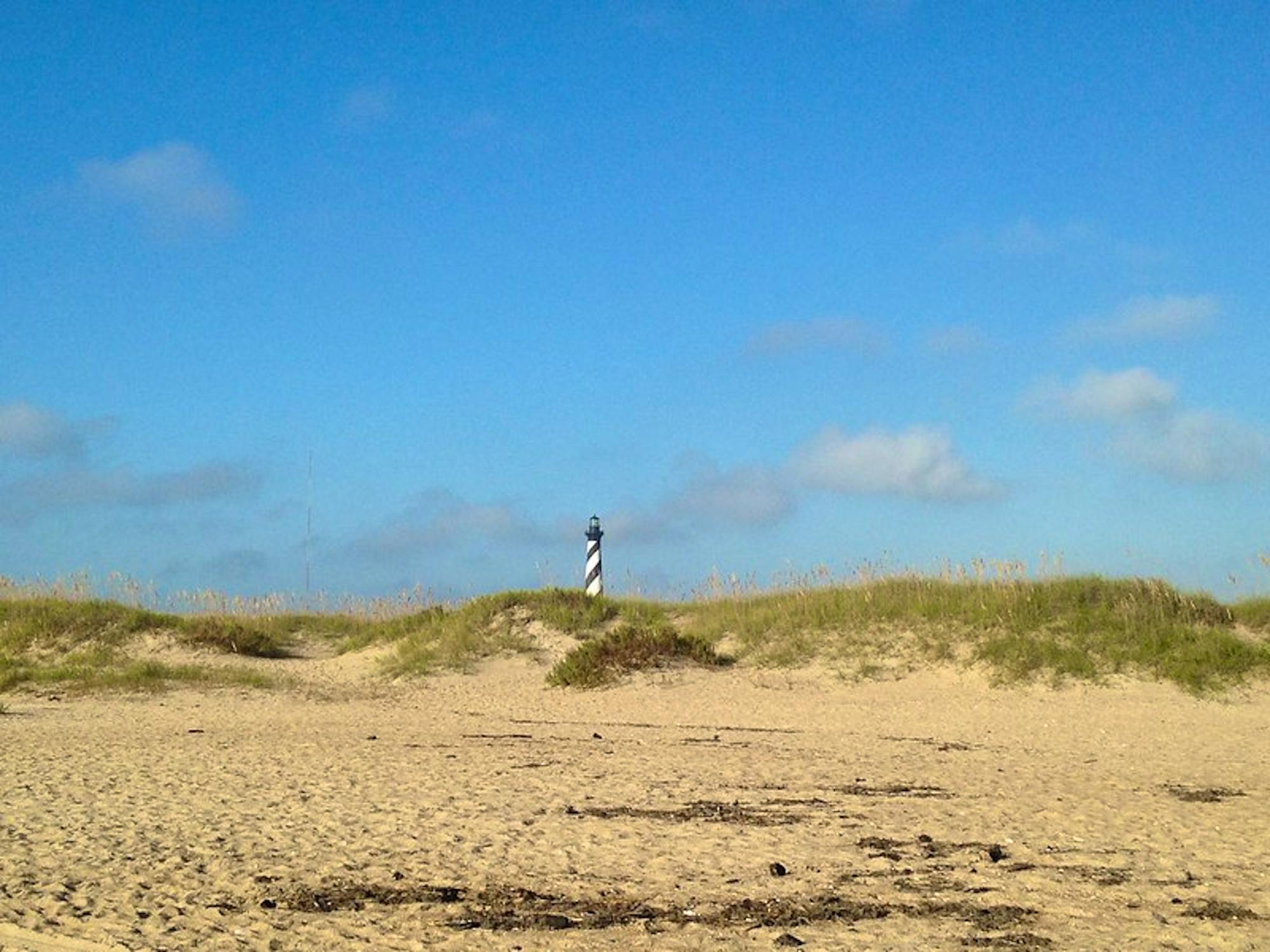 Cape Hatteras Lighthouse beyond the dunes.