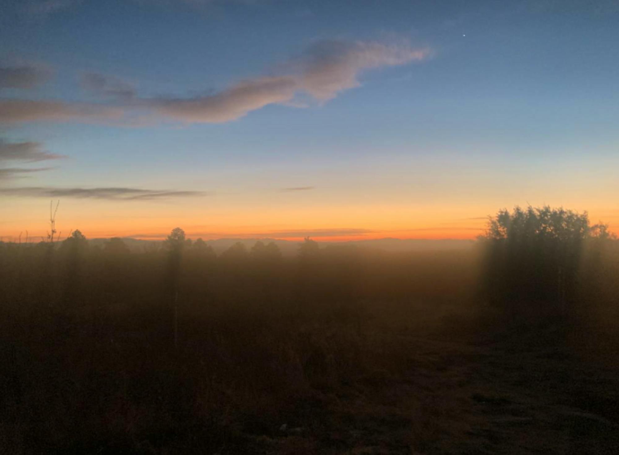 Sunrise over hills from campground