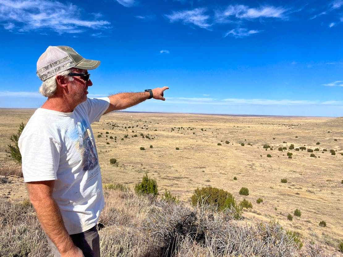 Reserve manager Jay Tutchton points to the newly acquired acres of the Heartland Ranch Nature Preserve.