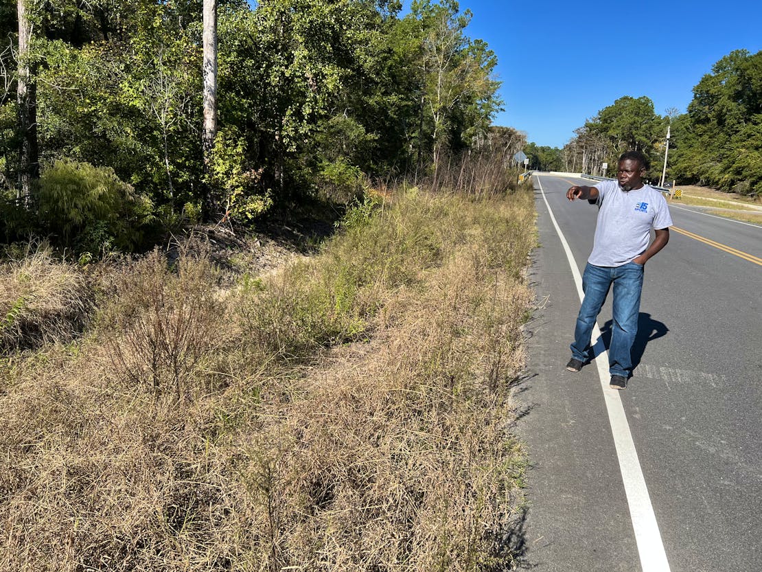 Kevin Mishoe, Bucksport resident and President of the Association for the Betterment of Bucksport, demonstrates to conservation partners how floodwaters move into the community