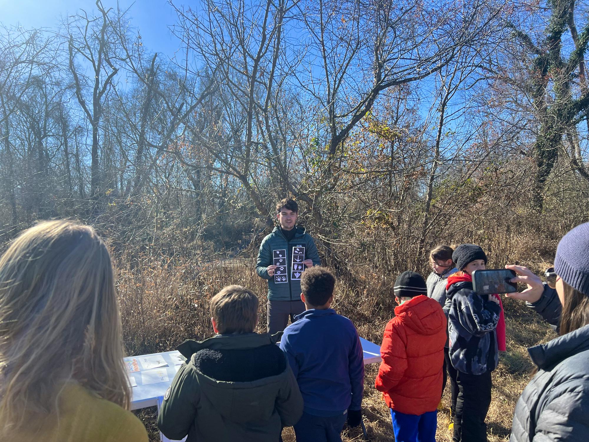 2023.11.29 - Intern Harrison Thweatt with students at Shade Your Stream event - NC - Ben Prater-DOW