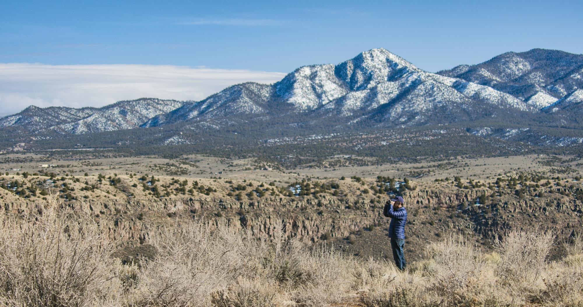 Birdwatching in mountain landscape