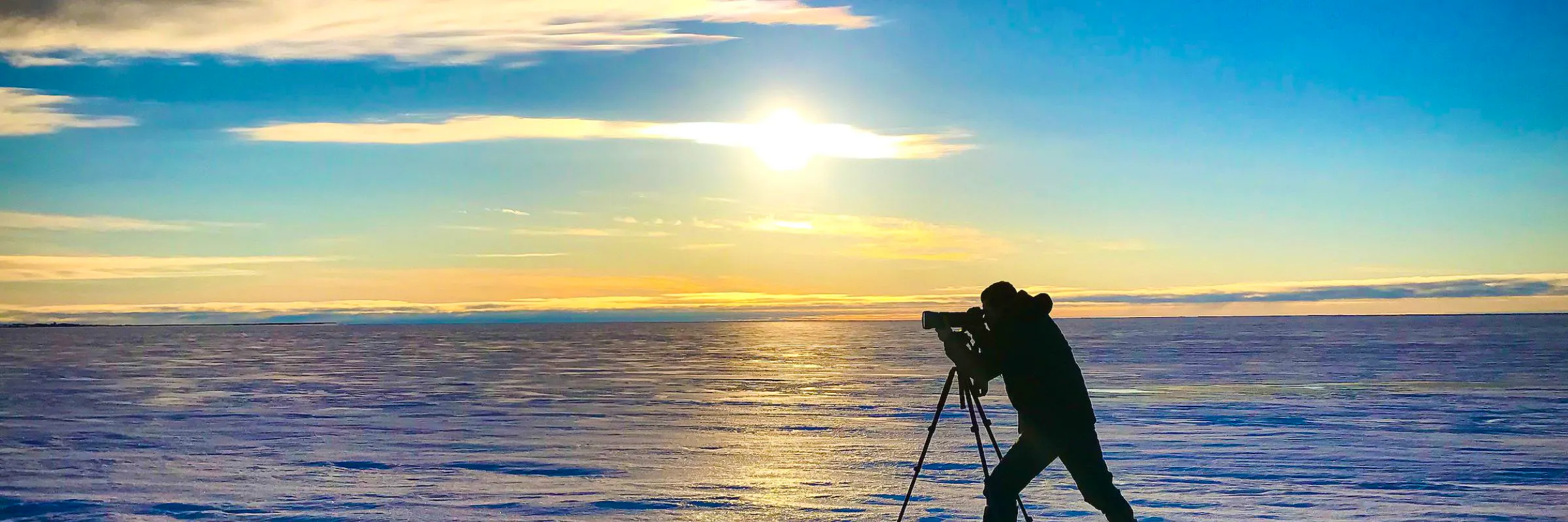 photographing the sunset over the Arctic Ocean
