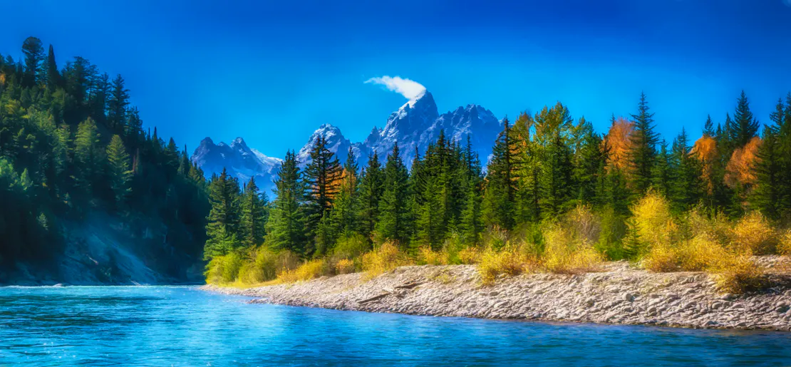 Snake River in the foreground and the Teton mountain range in the background.